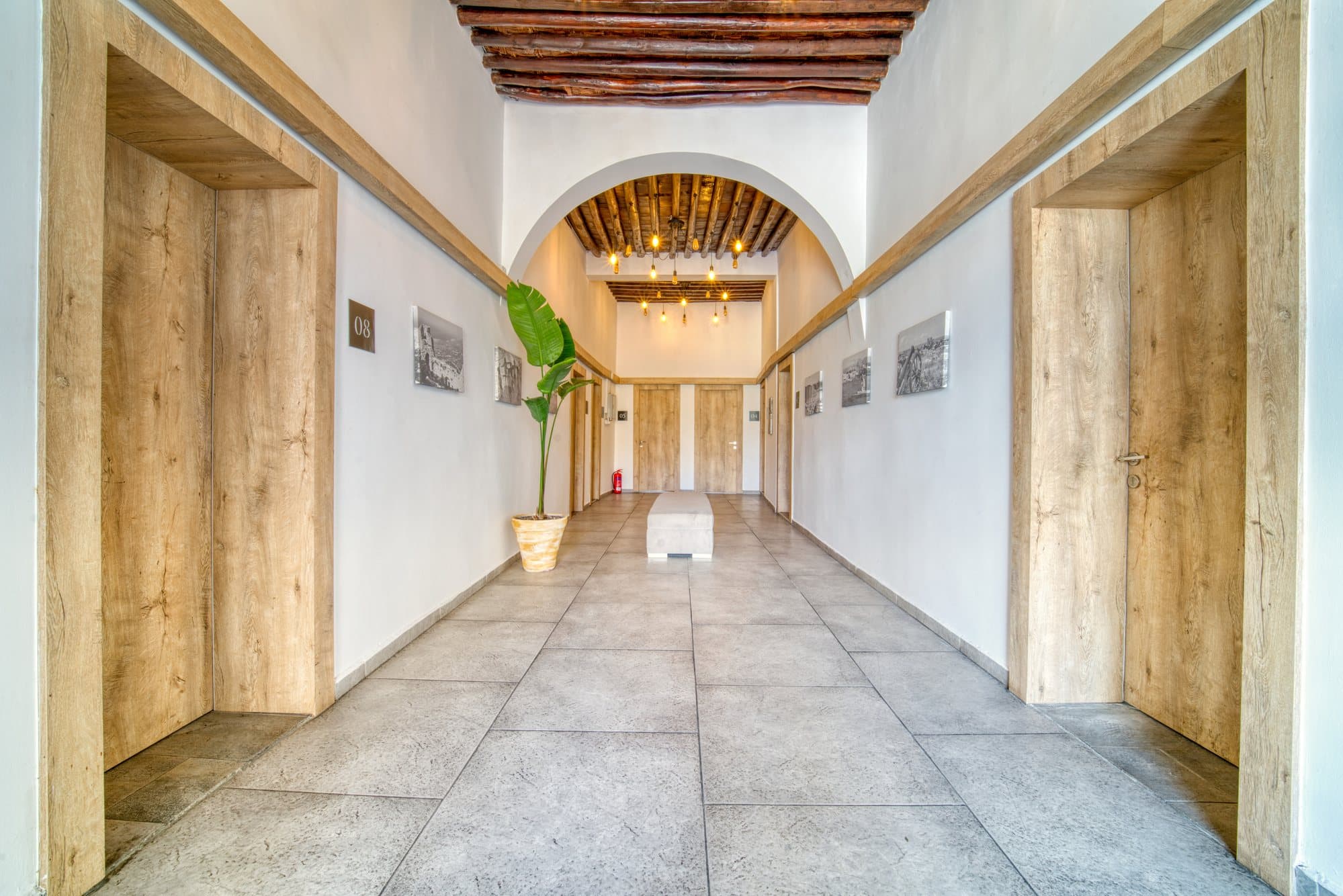 The arched corridor at Avenue Hotel